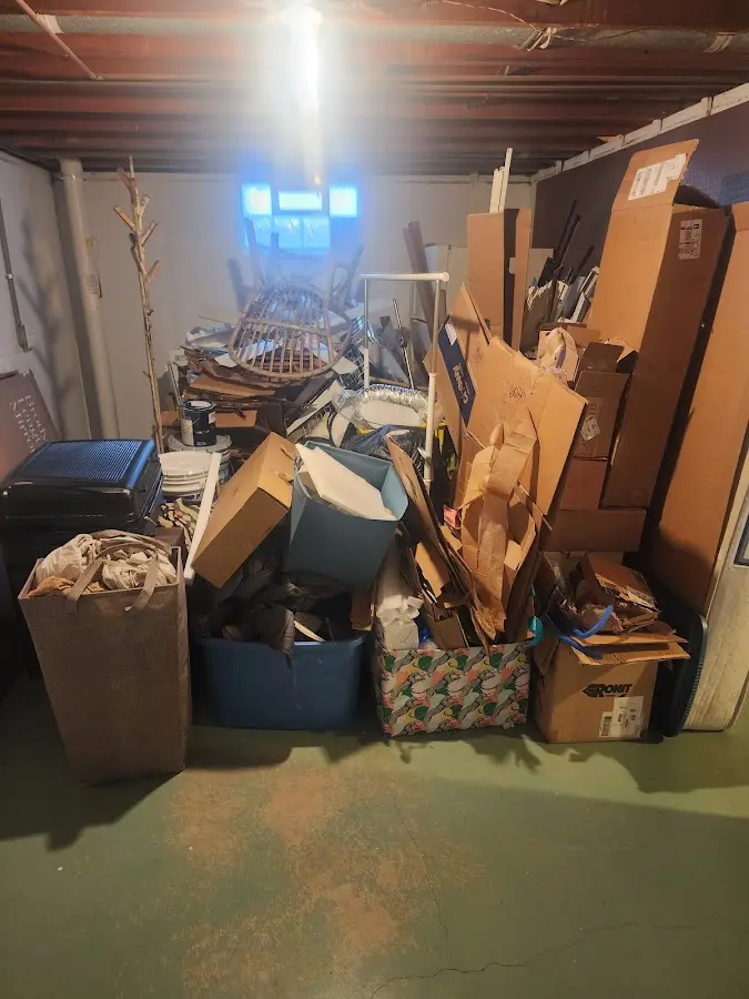 Roll-off dumpster container at job site for 8 Yard Dumpster Rental in Haleyville